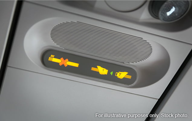 No smoking sign on plane